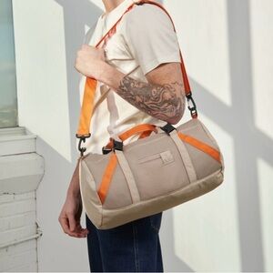 United by Blue reactive Orange Mini gym duffle bag